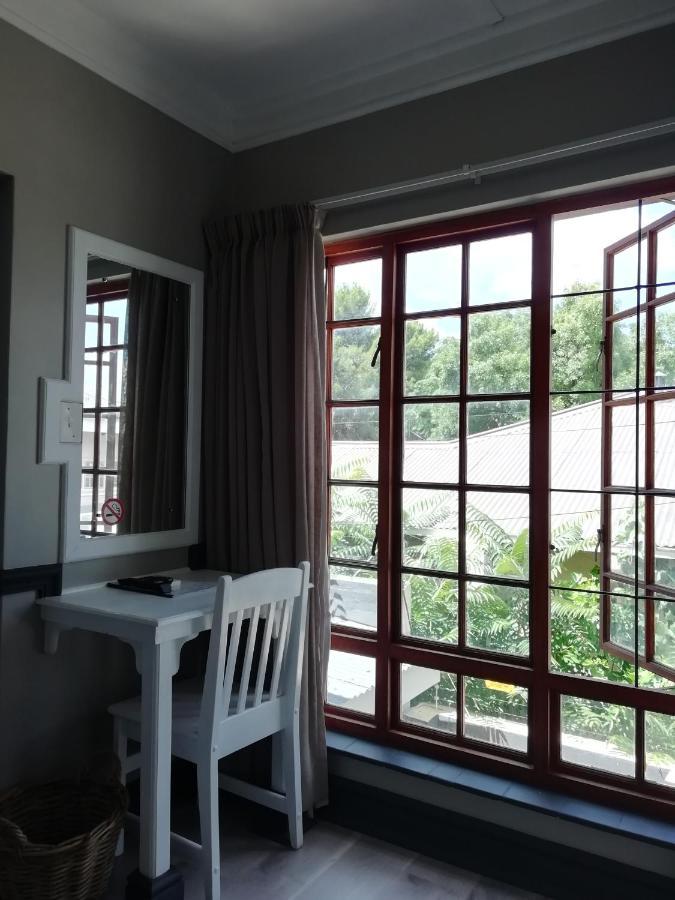 Oakwood Lodge Bloemfontein Exterior photo A window with burglar bars